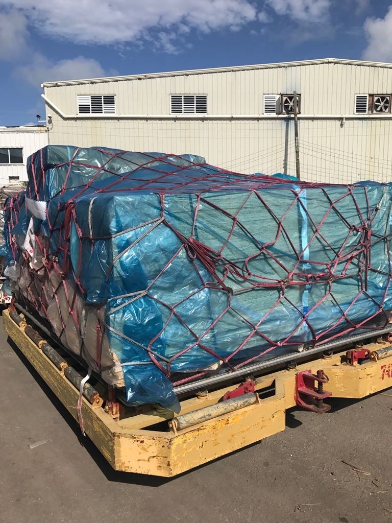 Supplies from Elliotts, along with other building donations, arrive in the Caribbean