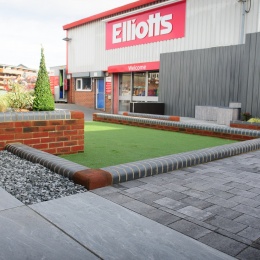 Landscaped area with Elliotts in background